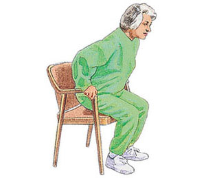 Woman grasping armrests to sit on a chair