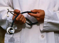 Picture of a physician holding a stethoscope