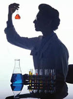 Picture of a female pathologist examining a container of liquid