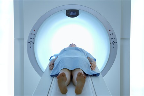 Photo of person about to receive PET Scan