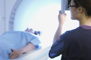Picture of a person going into an MRI scanner
