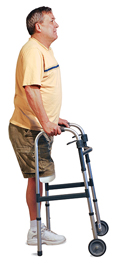 Man with amputated leg standing in center of walker, hands on grips.