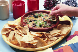 Bean dip on a plate with chips