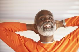 Photo of man with arms in starting position for chest stretch