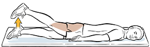 Man lying on stomach doing straight leg raises.