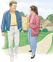 Man in cervical collar outdoors walking with woman.
