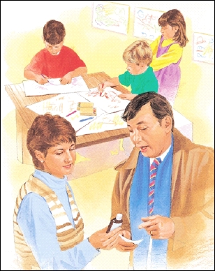 Man giving written instructions and prescription bottle to woman. Children playing at table in background.