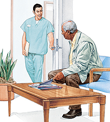 Health care provider greeting man in waiting room.
