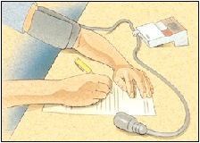 Man writing down his blood pressure numbers.