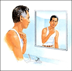 Man feeling neck and looking in mirror.