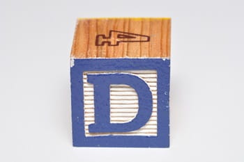 Alphabet block D isolated on a white background