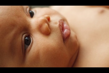 Closeup portrait of African American newborn baby