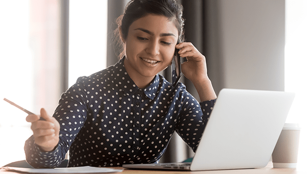 Woman on the phone applying for financial assistance