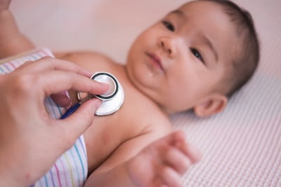 Baby having an examination