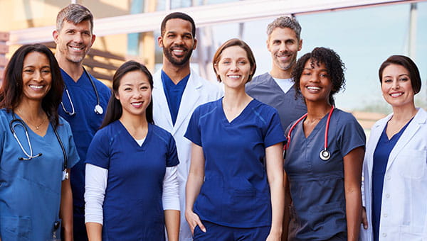 A diverse group of female and male doctors