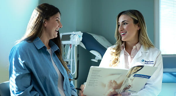 image of a doctor sharing information with a female patient