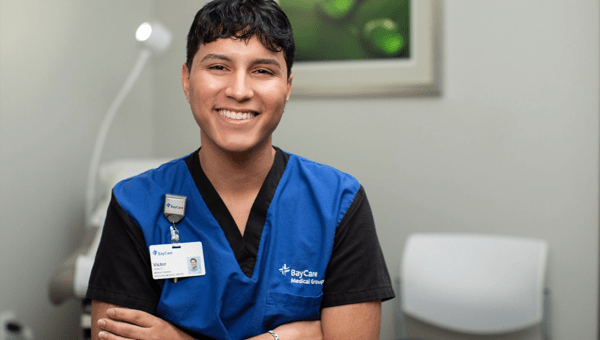 A BayCare team member smiles for a photo.