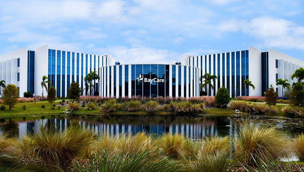 a view of BayCare System Offices from across the lake