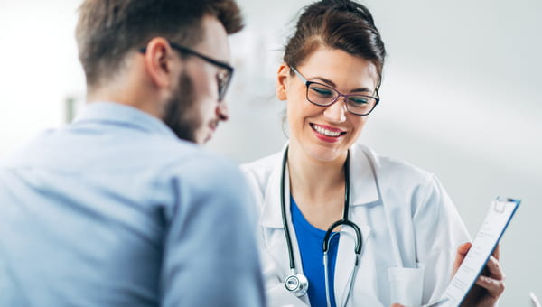 female doctor with male patient