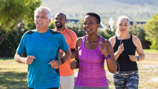 Group of adults jogging together outside