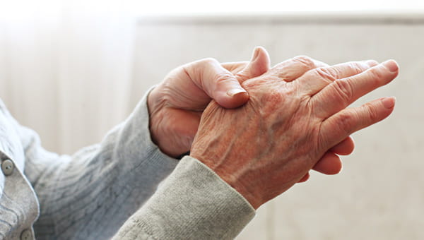 Two hands clasped