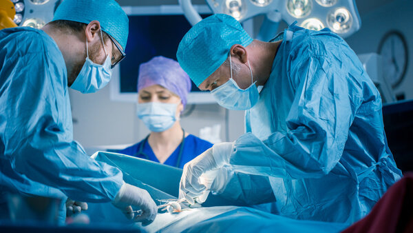 a team of surgeons operating on a patient