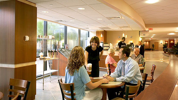 Visitors talking in the coffee shop of St. Anthony's Hospital 