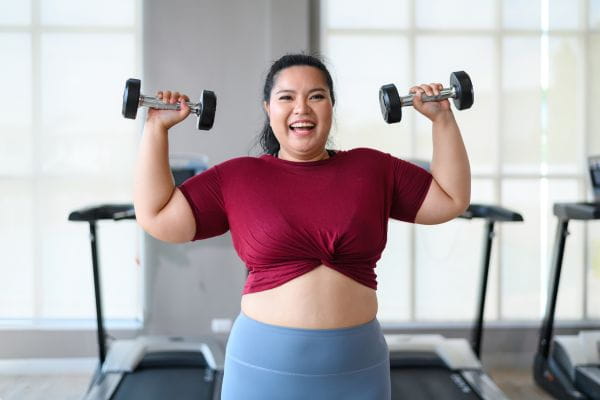A woman lifting weights