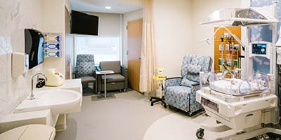 Our spacious and private NICU rooms with Giraffe warmer.