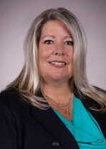 A headshot photo of Nanette Wilcox.