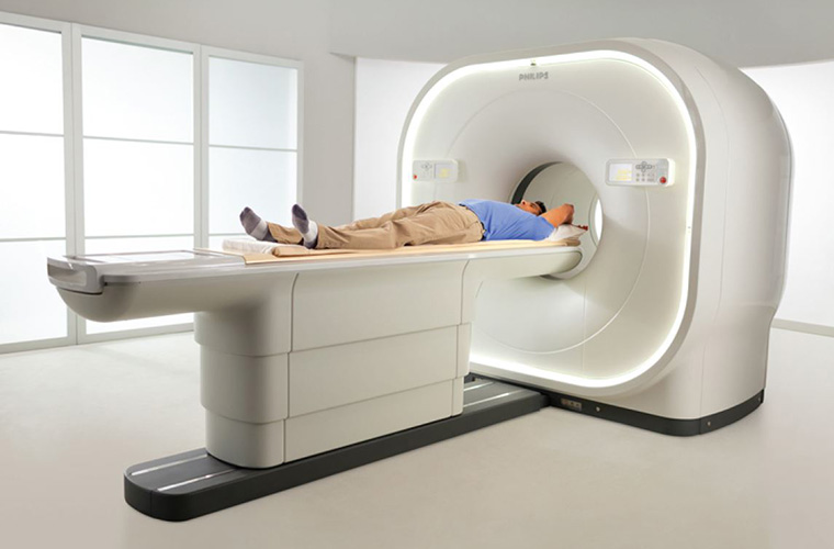 patient having a scan done on a pet ct machine