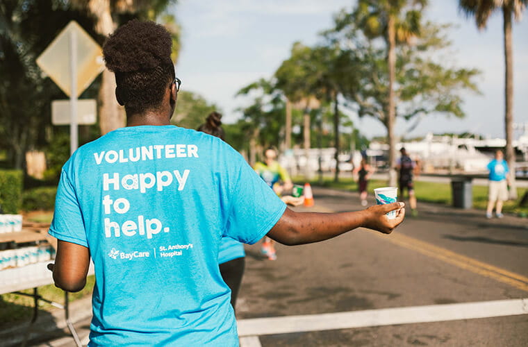 event wearing a light blue shirt