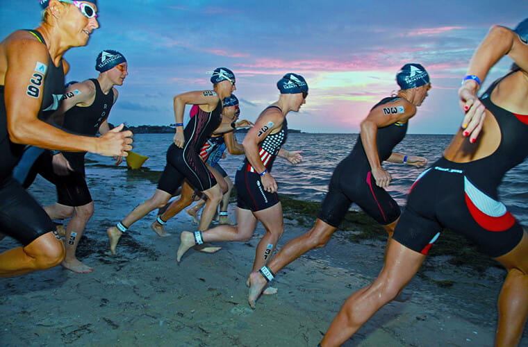 Swimmers starting a triathlon