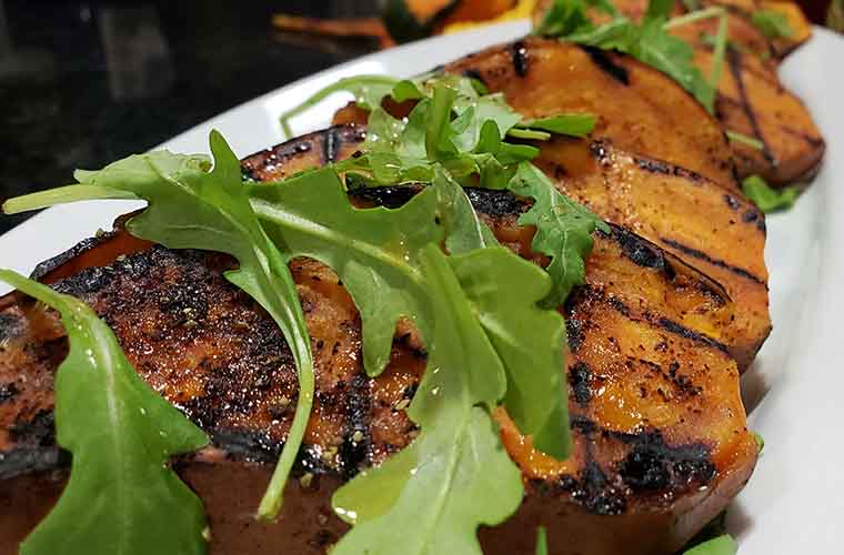 Ginger Grilled Sweet Potatoes with Black Pepper Honey and Baby Arugula 