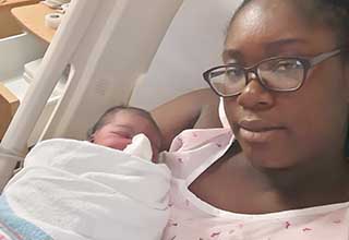 WHWH Patient Beats COVID, Gives Birth and Receives Her Ph.D. 