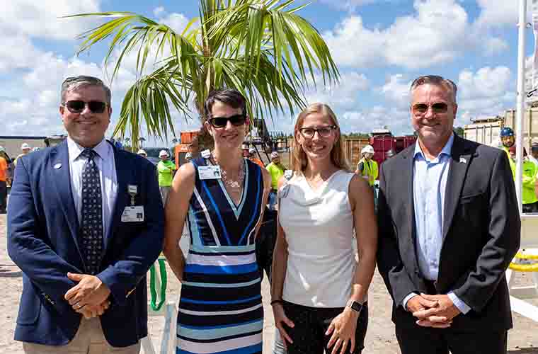 Four guests at the topping out ceremony