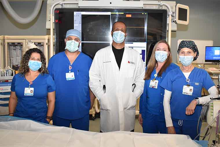 From left, Natalie Milanovic, Allan Reimann, Dr. Khamare, Jessica Schoonover, Rebecca Anderson. The group is involved in performing shockwave lithotripsies.