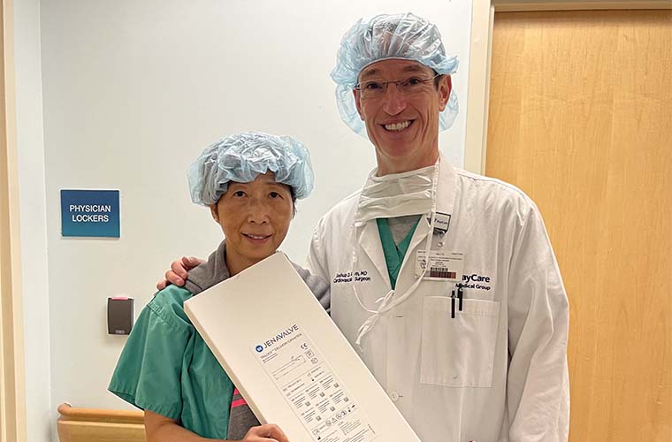Interventional cardiologist Lang Lin, MD, and cardiovascular surgeon Joshua Rovin, MD, FACS, stand together after being the first in Florida to use TAVR to treat aortic regurgitation.