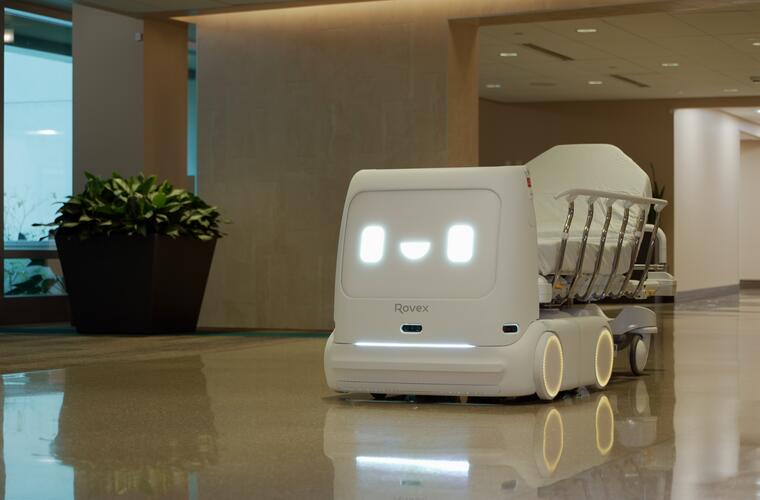 Autonomous robotic transport system moving through BayCare’s Morton Plant Hospital hallway.