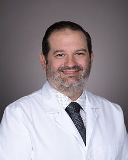 A headshot of Dr. Johnathan Frunzi, MD.