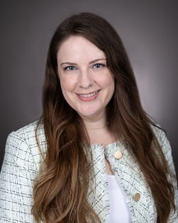 A headshot of the program manager, Sarah Perry.
