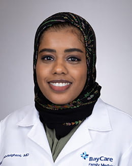 Headshot of Sarah Abdeleghani, MD in a lab coat 