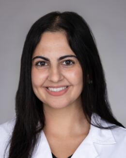 Headshot of Dr. Boulous wearing a lab coat