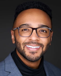 A headshot of Dr. Omar Jean-Baptiste