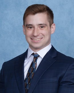 A headshot of Dr. Kyle Murchison