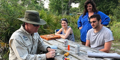 Wilderness Medicine: Dr. Anderson shows how to make a fire.