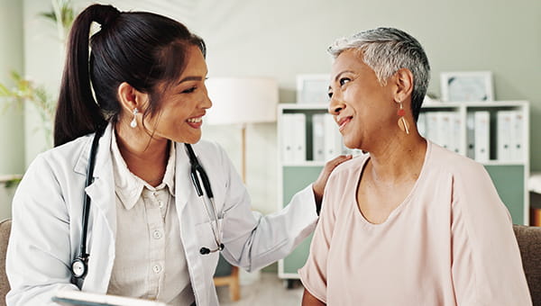 A provider consulting a patient