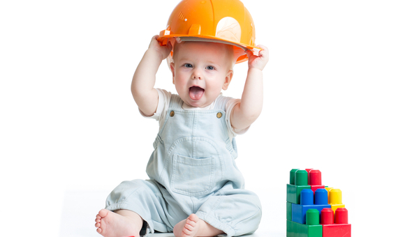 baby with a hard hat