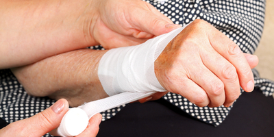 Bandage being replaced by Homecare staff