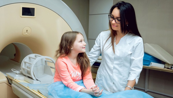 Imaging Tech with a Pediatric Patient